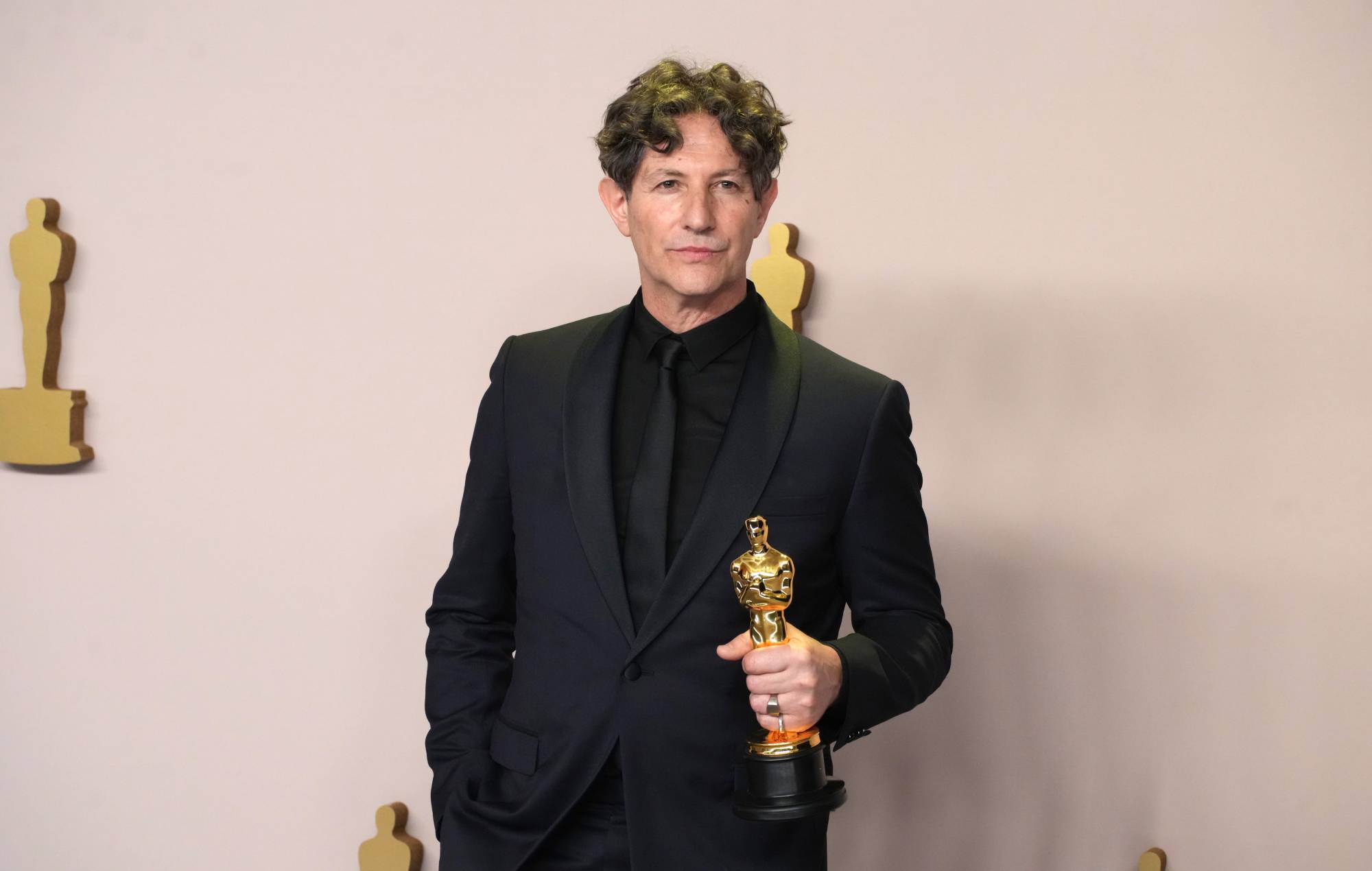 Jonathan Glazer, winner of the Best International Feature Film award for “The Zone of Interest”, onstage in the press room at the 96th Annual Academy Awards at Ovation Hollywood on March 10, 2024 in Hollywood, California. (Photo by Jeff Kravitz/FilmMagic)