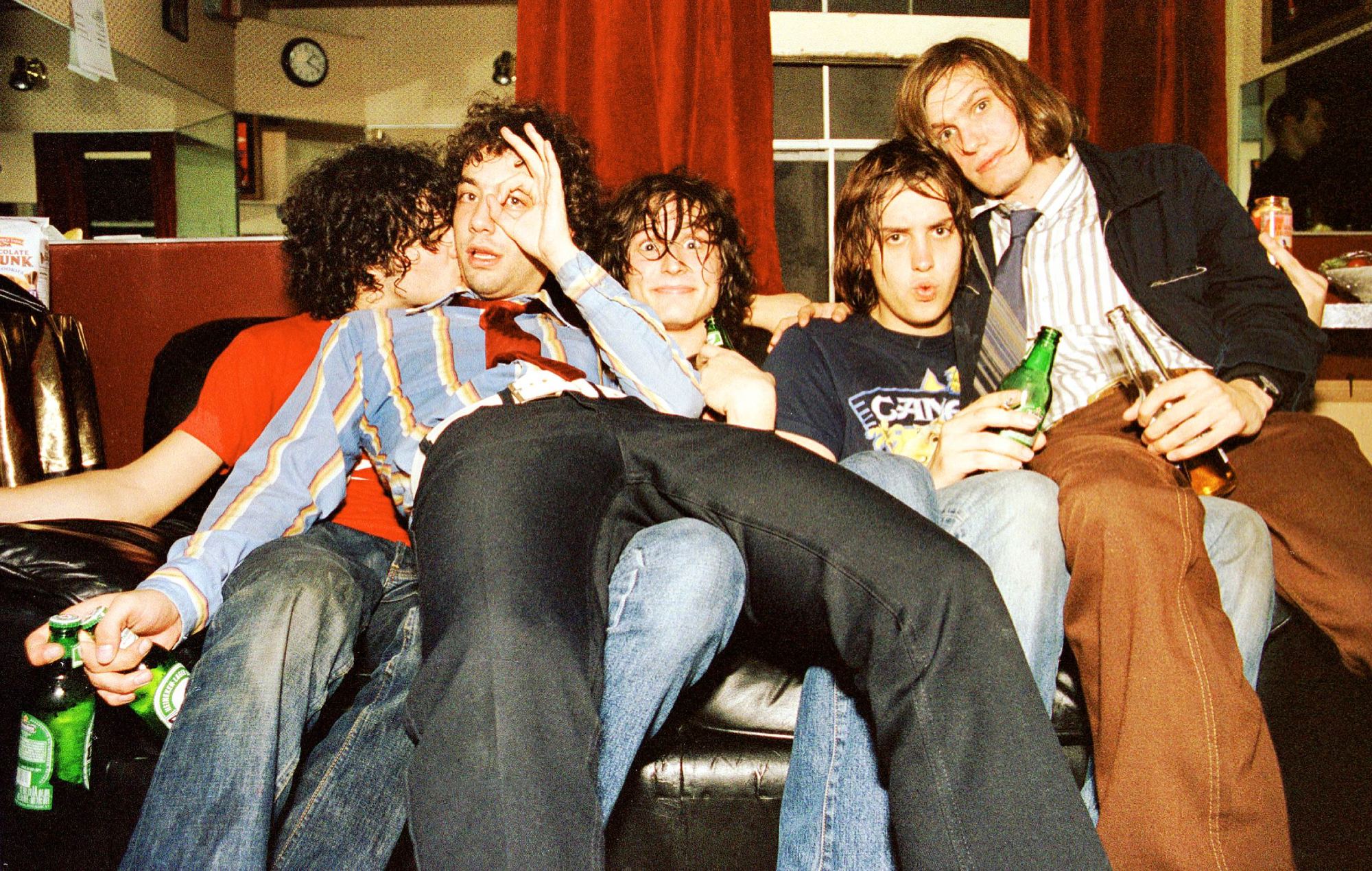 The Strokes backstage in California in 2001 (Photo by Anthony PIdgeon/Redferns)