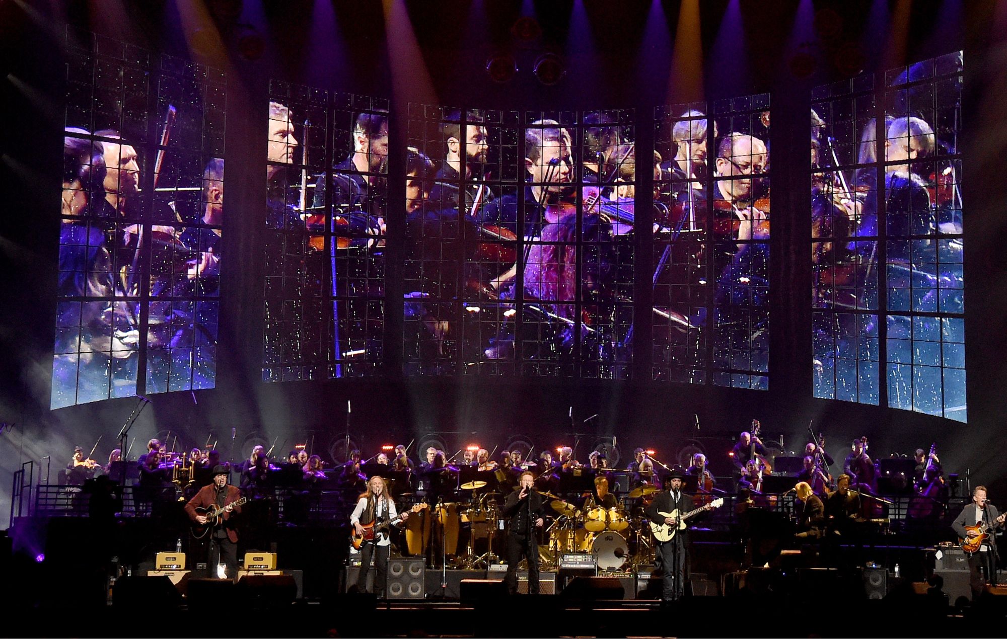Vince Gill, Timothy B. Schmit, Don Henley, Scott F. Crago, Deacon Frey, Joe Walsh and Steuart Smith of the Eagles perform with an orchestra at MGM Grand Garden Arena on September 27, 2019 in Las Vegas, Nevada. 