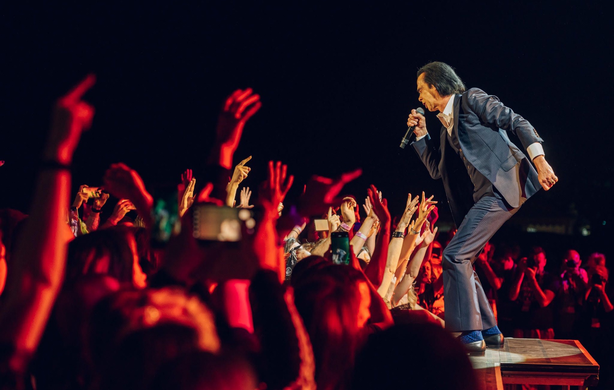 Nick Cave performing live on stage