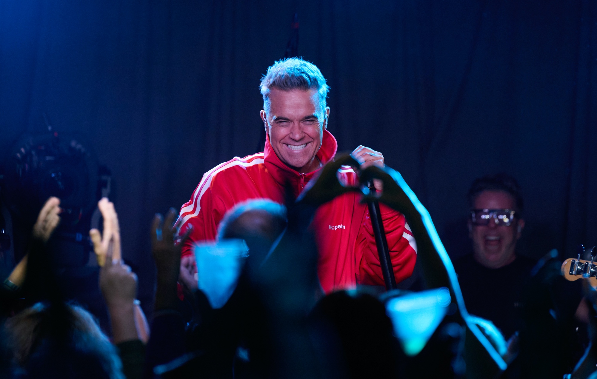 Robbie Williams performing live on stage at Dingwalls in Camden