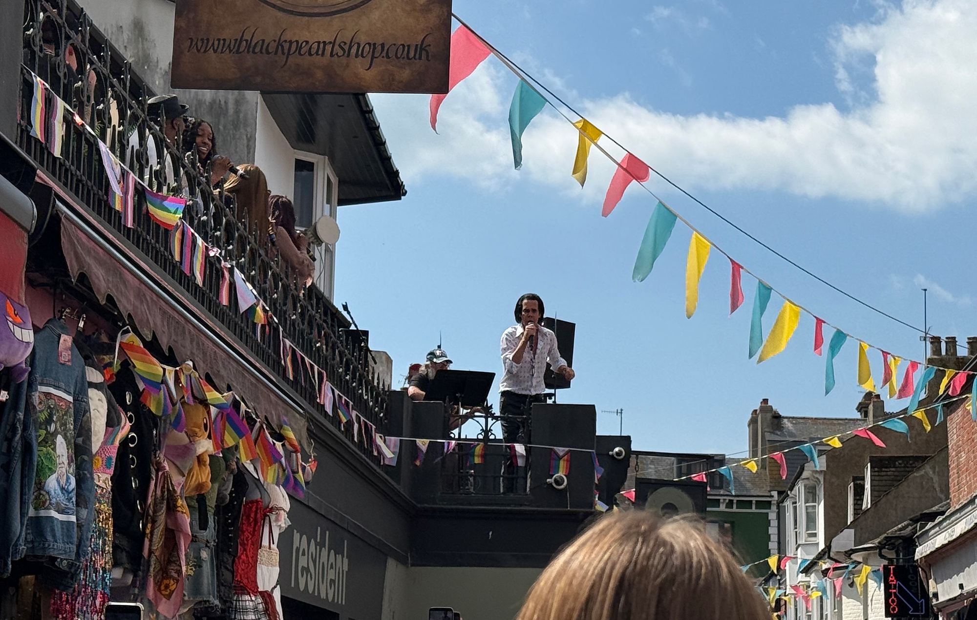 Nick Cave & The Bad Seeds perform on the roof of Resident Records in Brighton, July 2026. Credit: Andrew Trendell