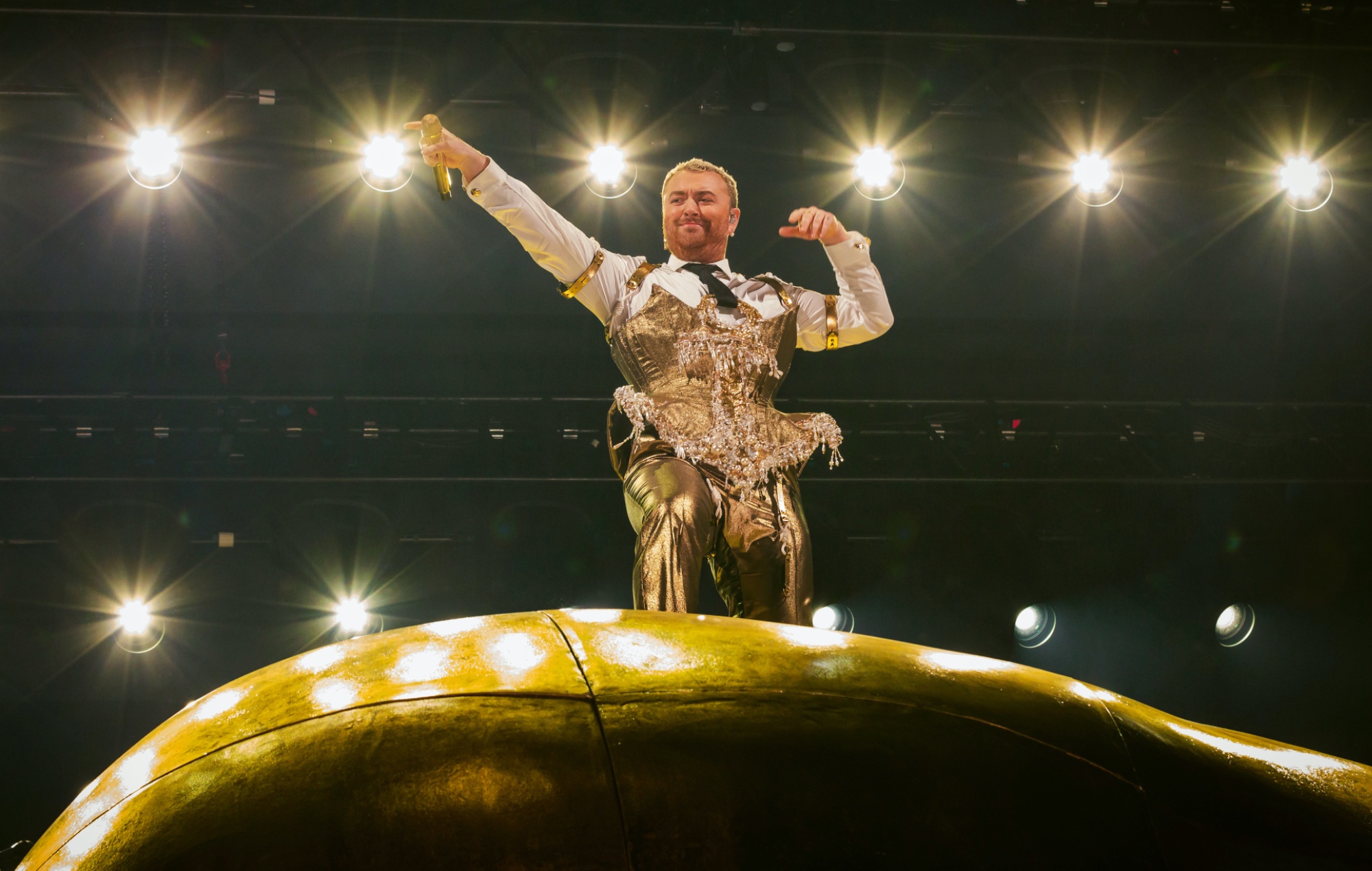 Sam Smith performing live on stage, photo by Frank Hoensch/Redferns/Getty