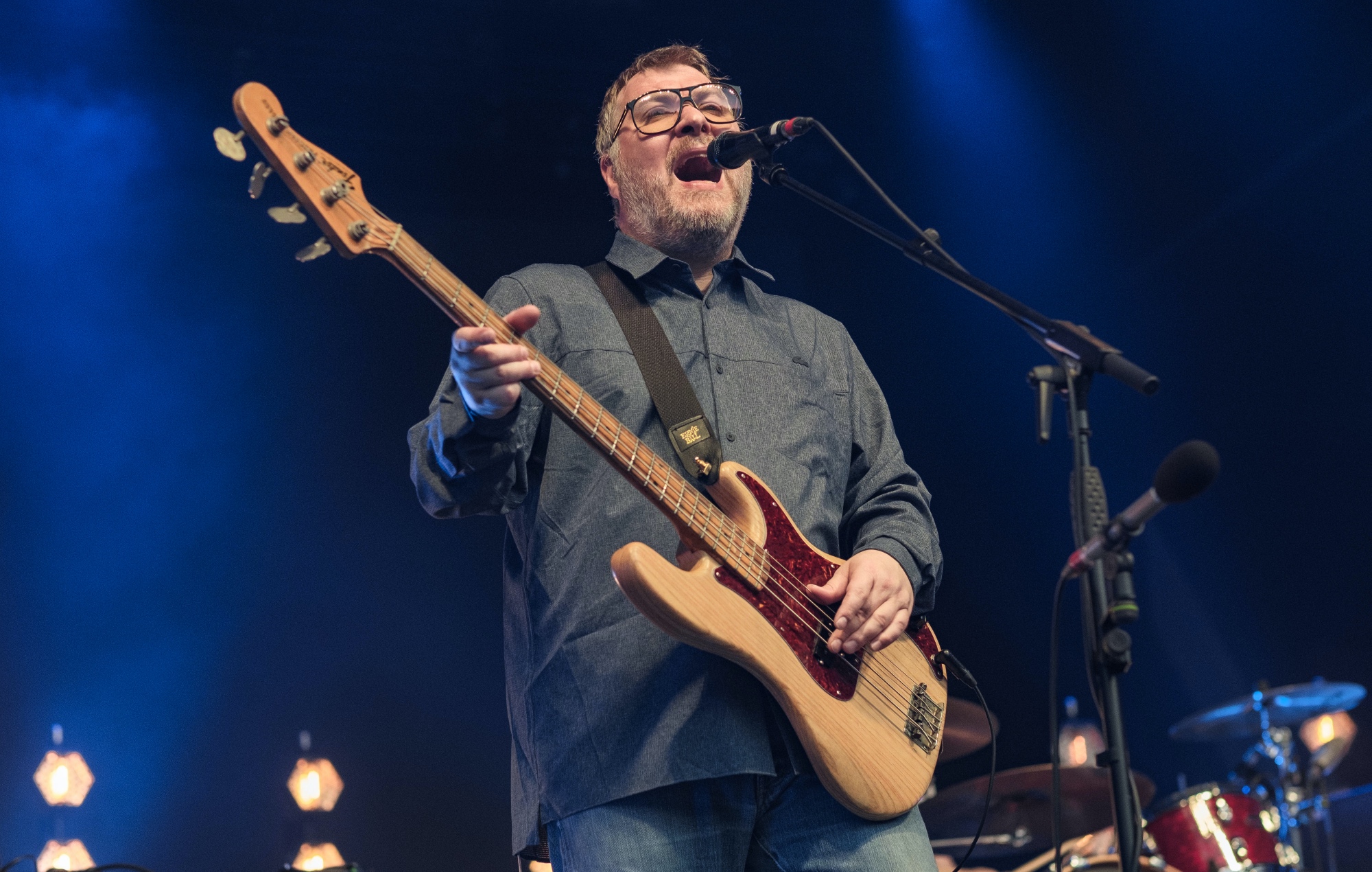 Jimi Goodwin performing live on stage with Doves