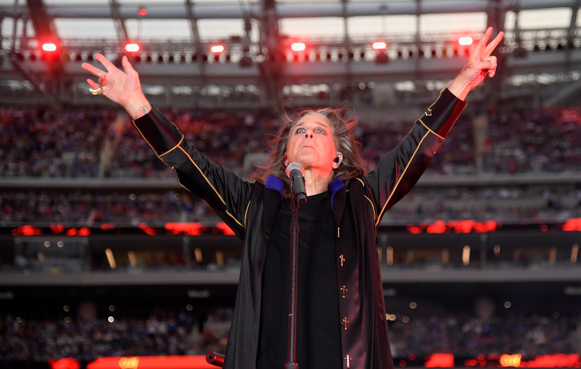 Ozzy Osbourne performing live on stage, photo by Kevork Djansezian/Getty