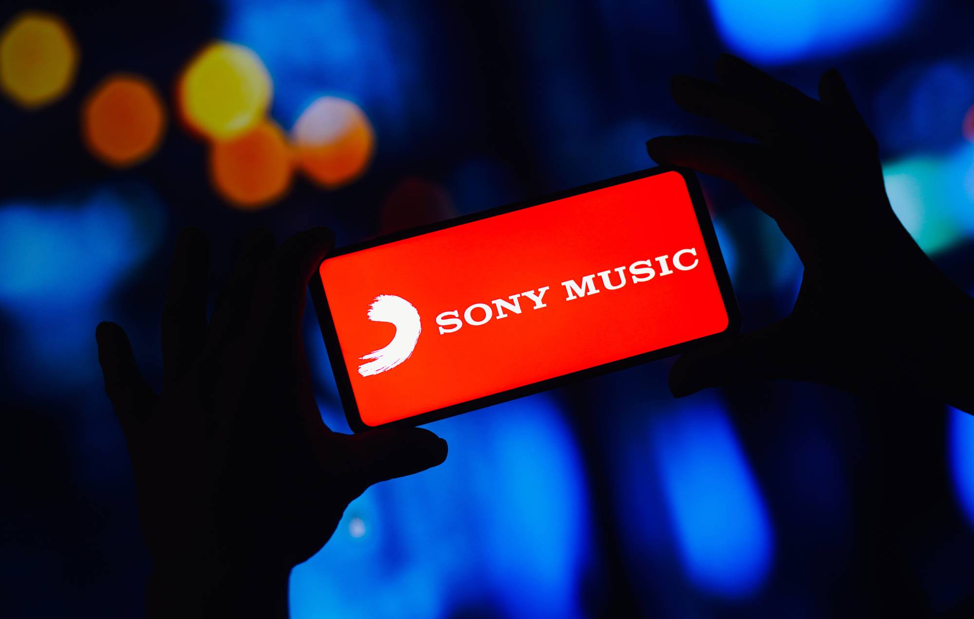 In this photo illustration, the Sony Music Group logo is displayed on a smartphone screen. (Photo Illustration by Rafael Henrique/SOPA Images/LightRocket via Getty Images)