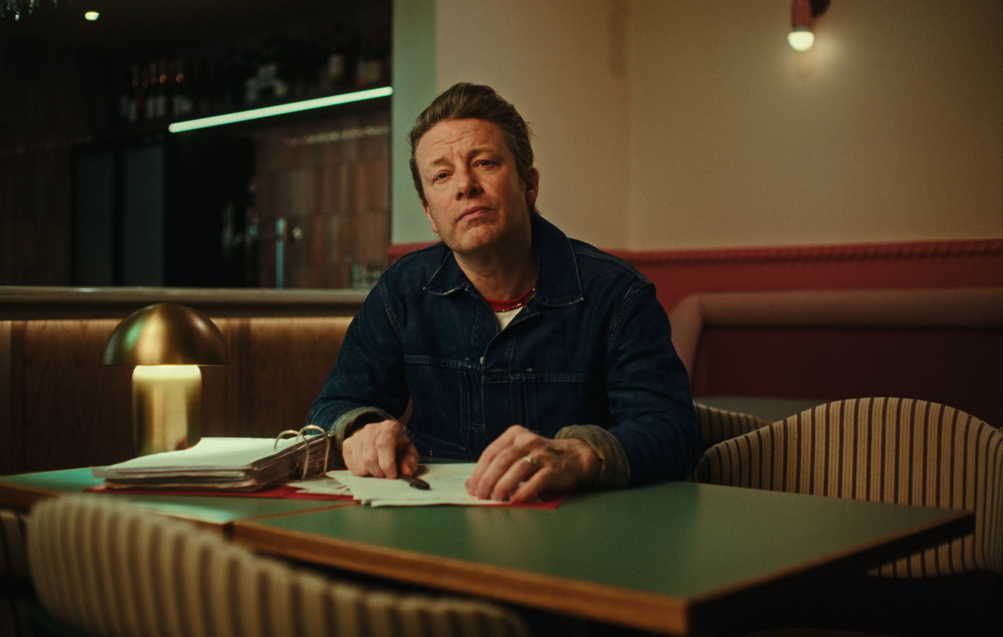CMAT and Jamie Oliver in the official music video for 'The Jamie Oliver Petrol Station' 