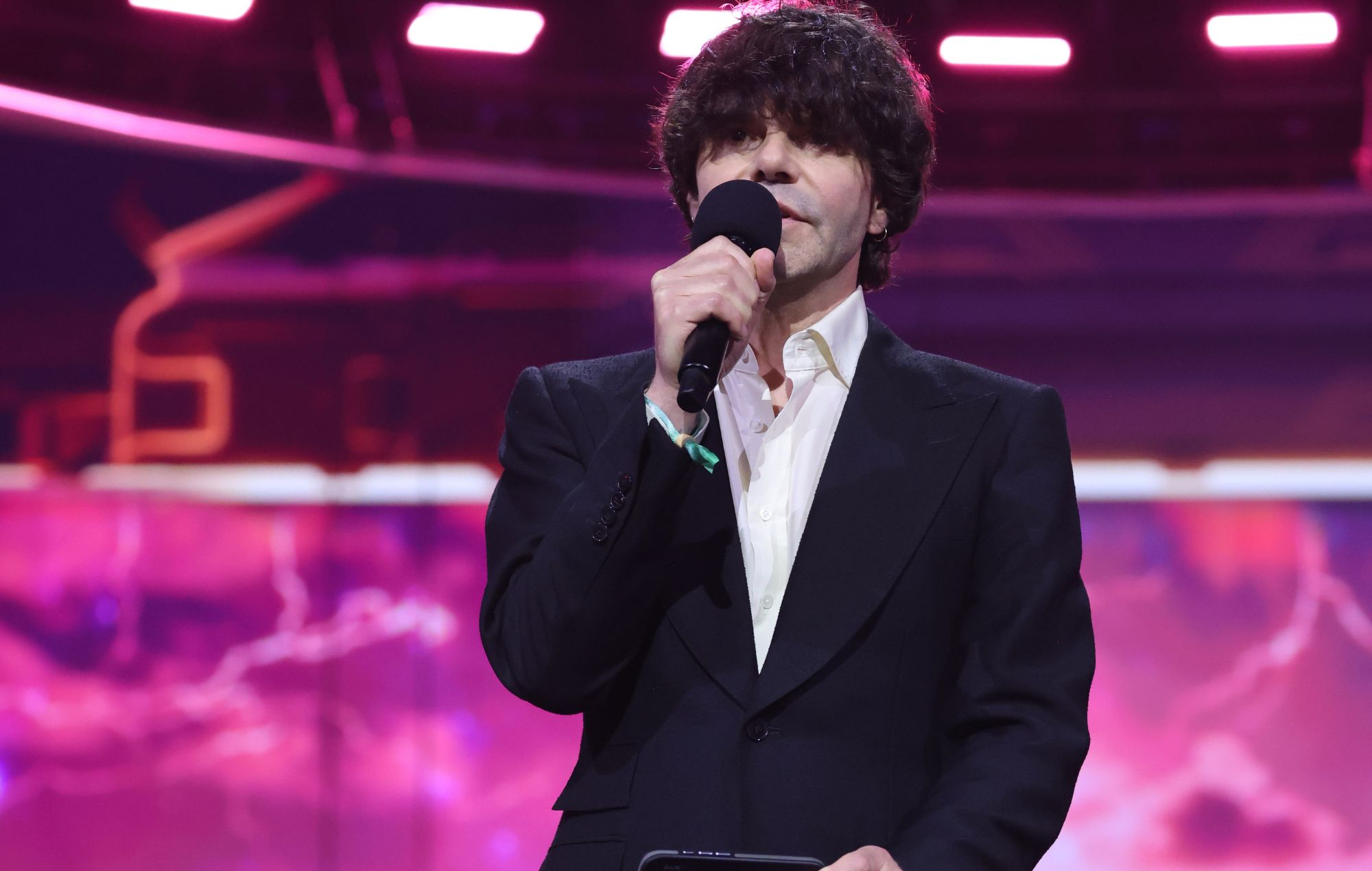 Burgess on stage during The BRIT Awards 2026