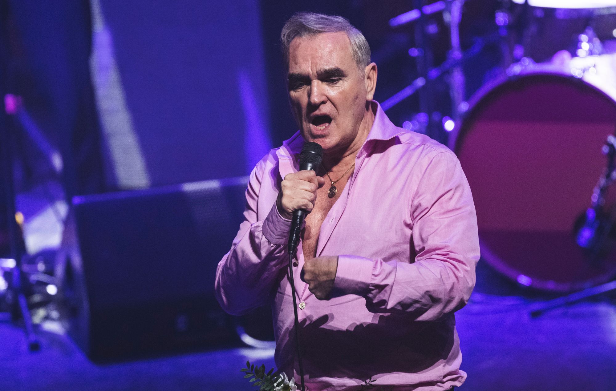 Morrissey performs on stage in 2026