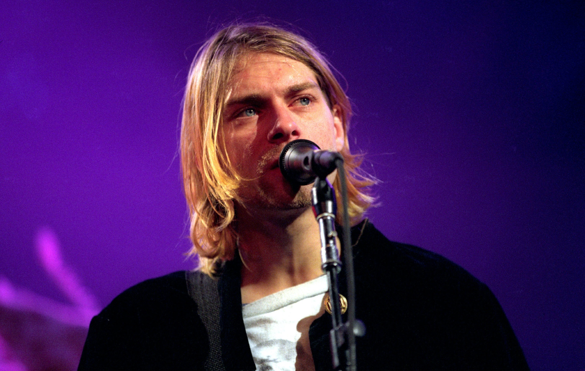 Kurt Cobain performing live on stage, photo by Jeff Kravitz/FilmMagic/Getty