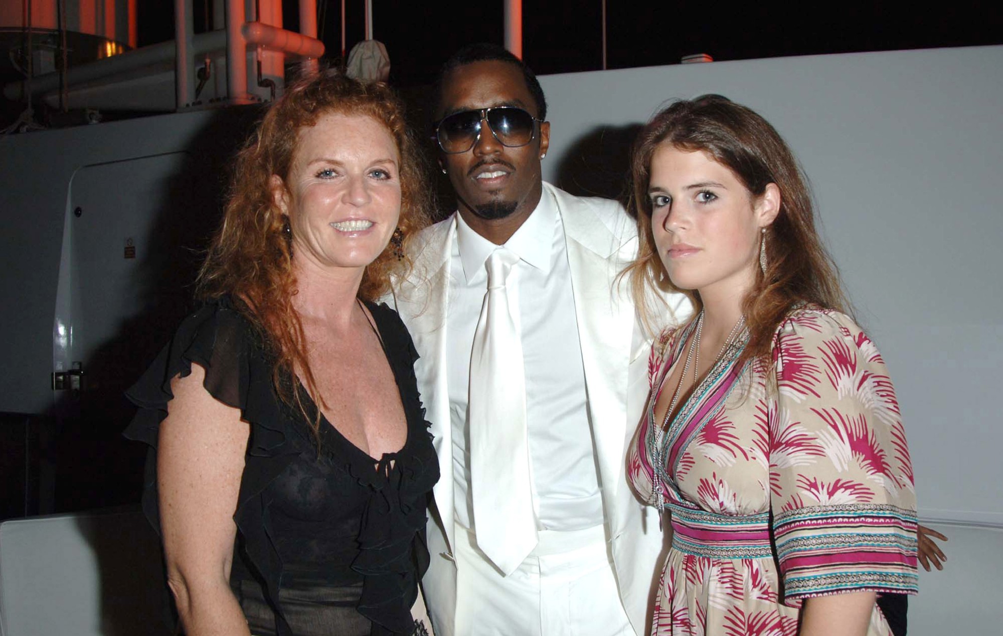 Sean "Diddy" Combs, Sarah Ferguson the Duchess of York and Princess Eugenie pictured at the "Unforgivable" fragrance celebration dinner in St Tropez, 2006