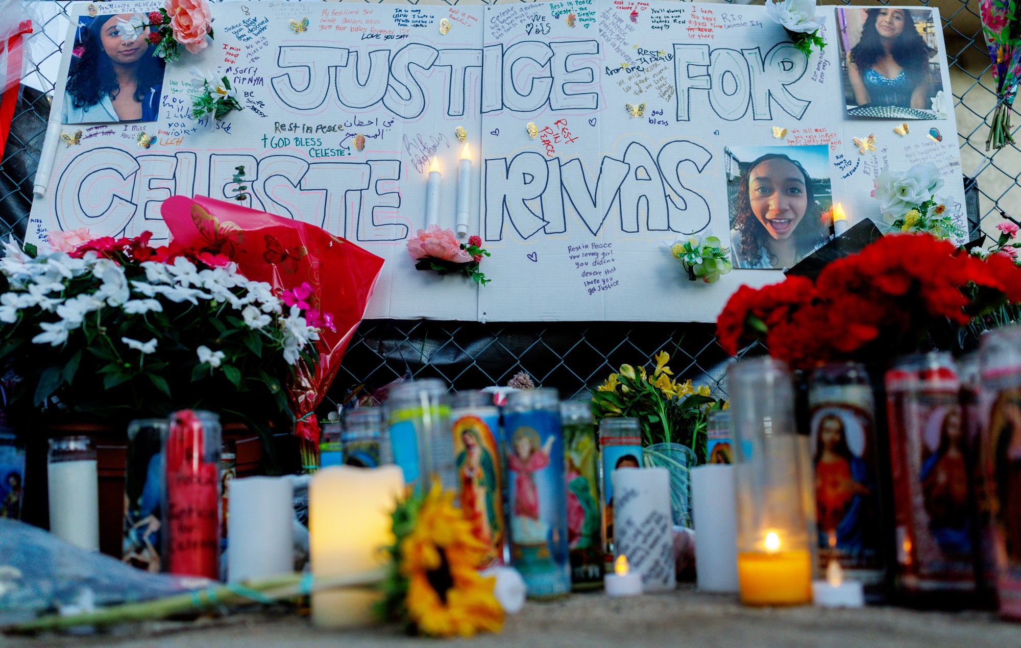 Notes, candles and flowers at a memorial for Celeste Rivas Hernandez