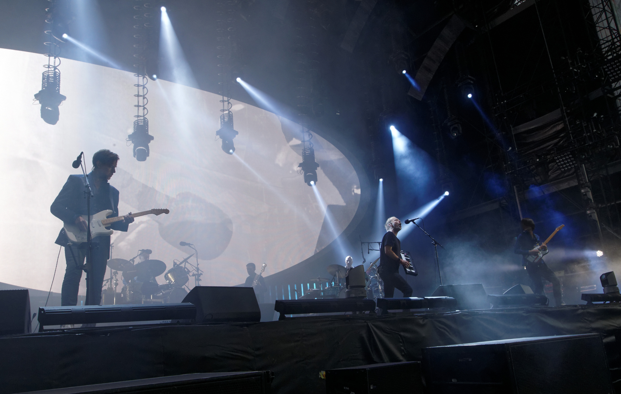 Radiohead performing live on stage, photo by Sylvain Lefevre/Getty