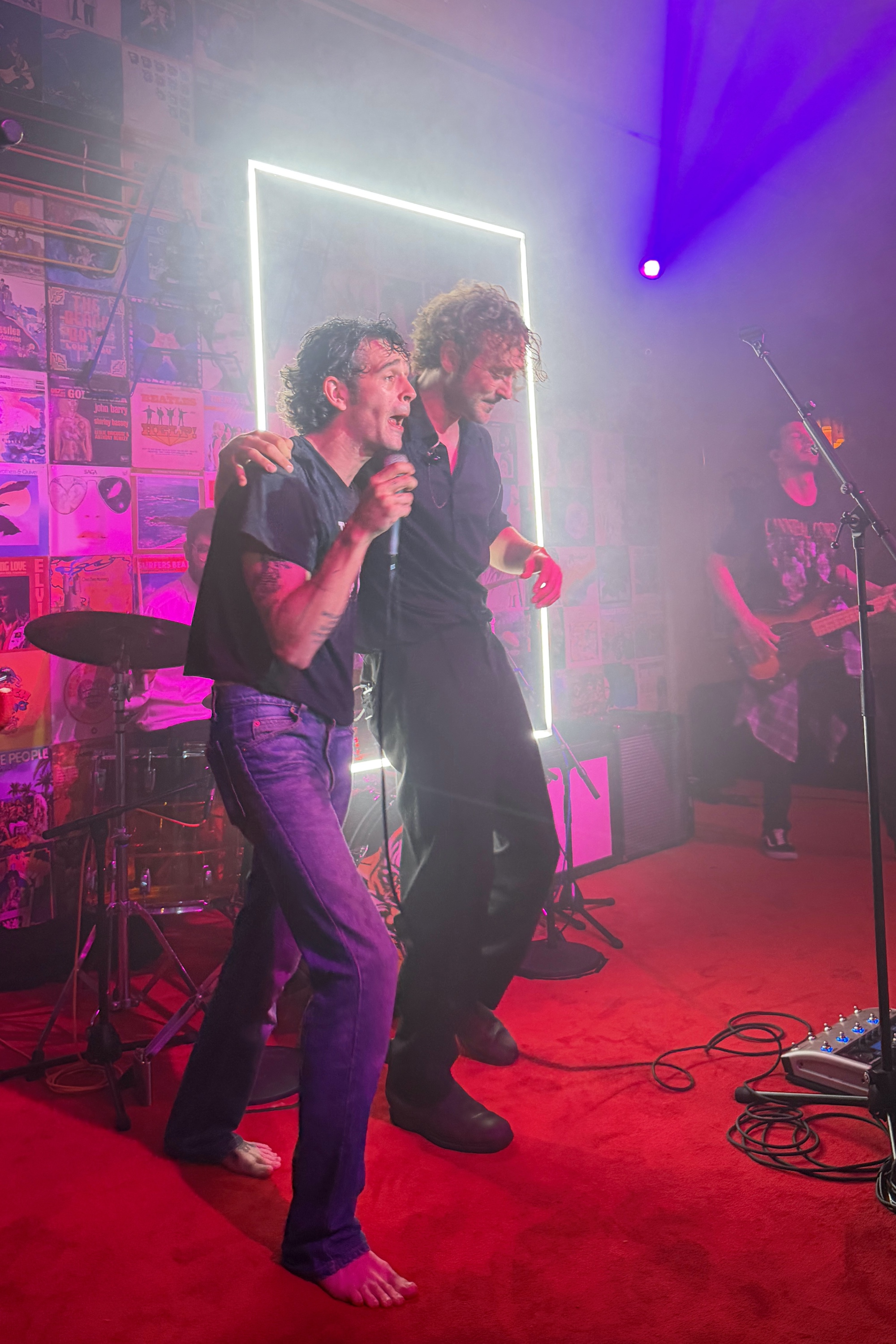 Matty Healy performing live on stage with The 9075 tribute band