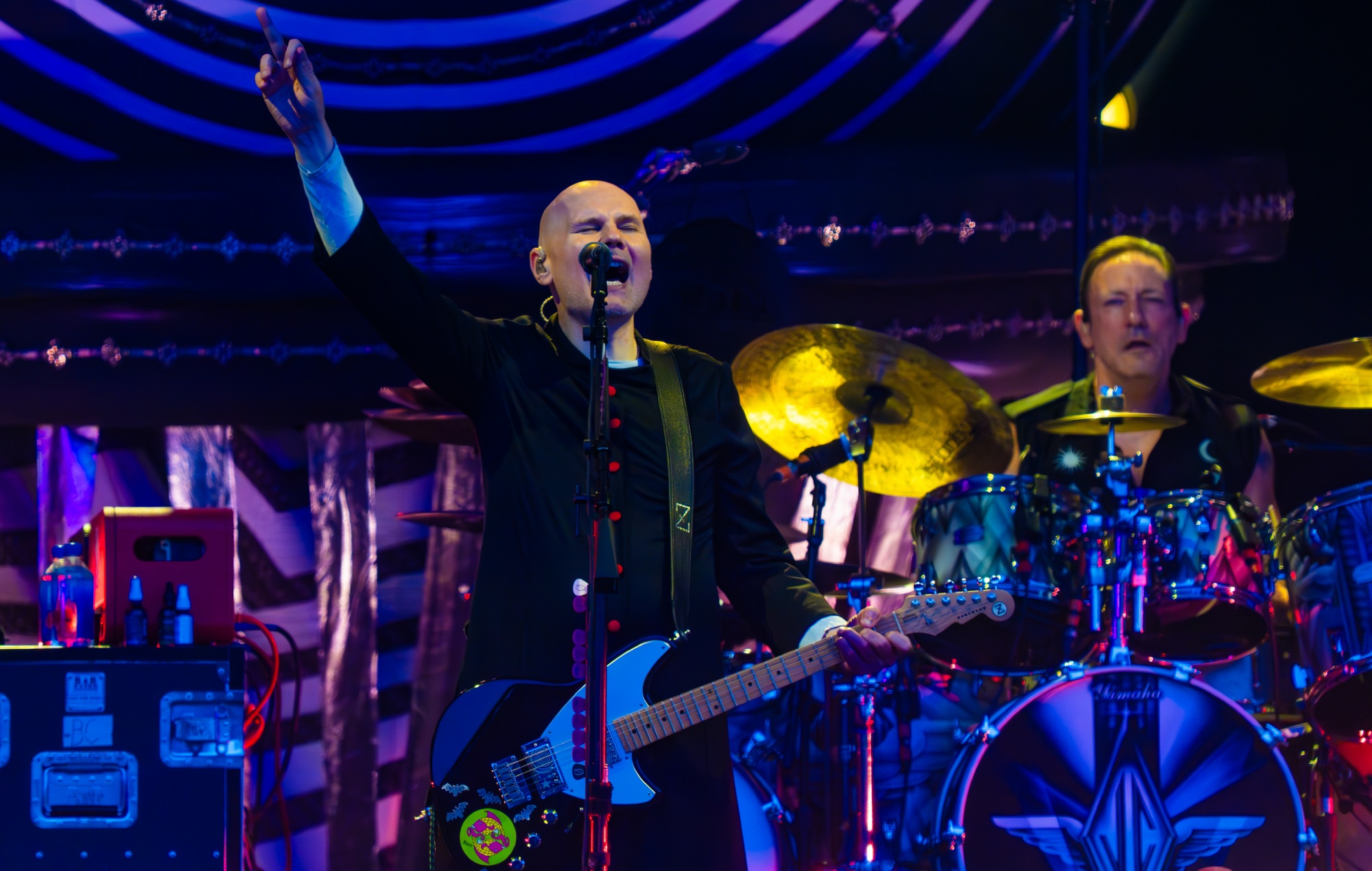 Smashing Pumpkins performing live on stage, photo by Lorne Thomson/Redferns/Getty