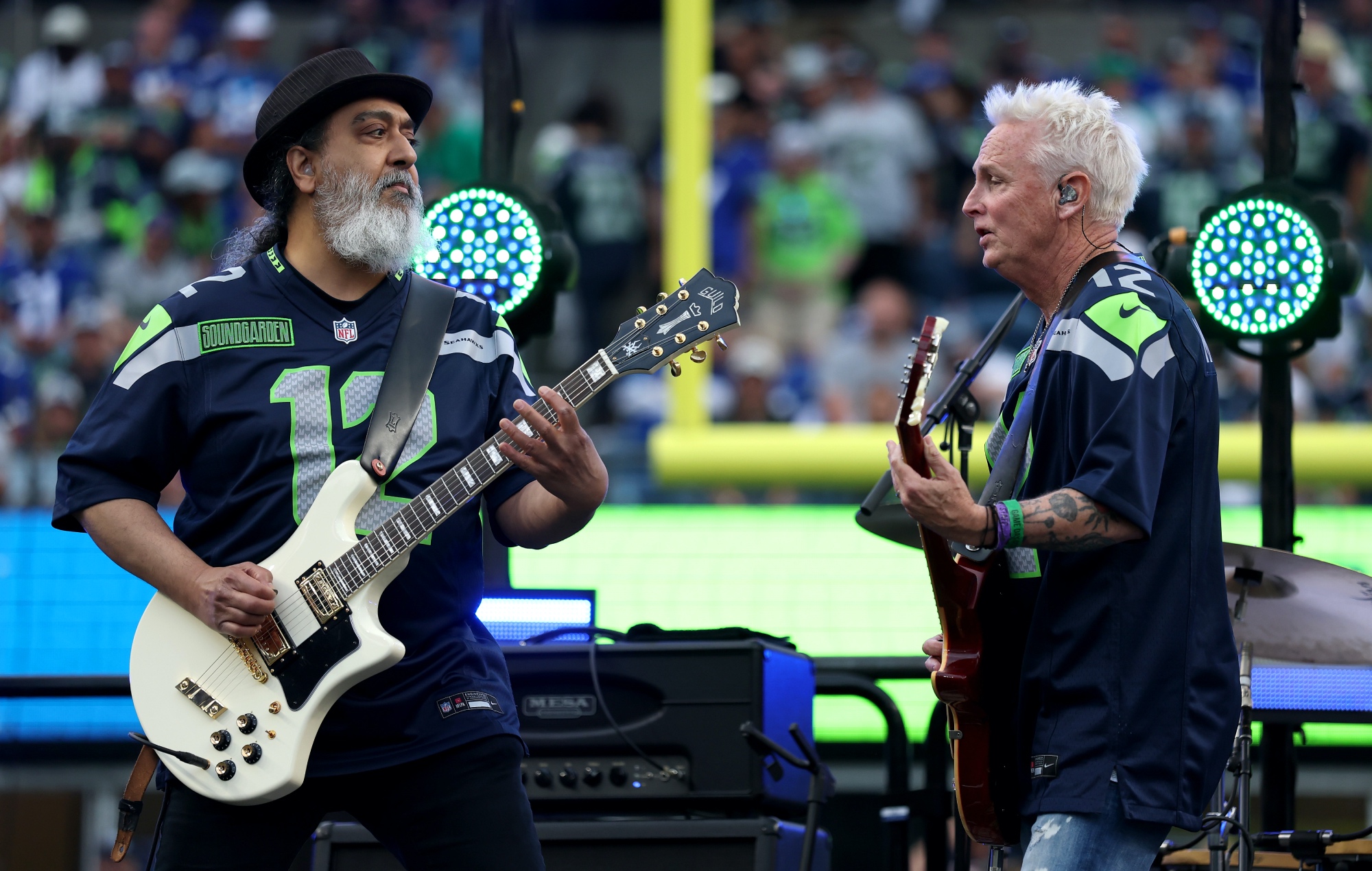 Kim Thayil of Soundgarden and Pearl Jam's Mike McCready perform during the NFL halftime show, photo by Steph Chambers/Getty