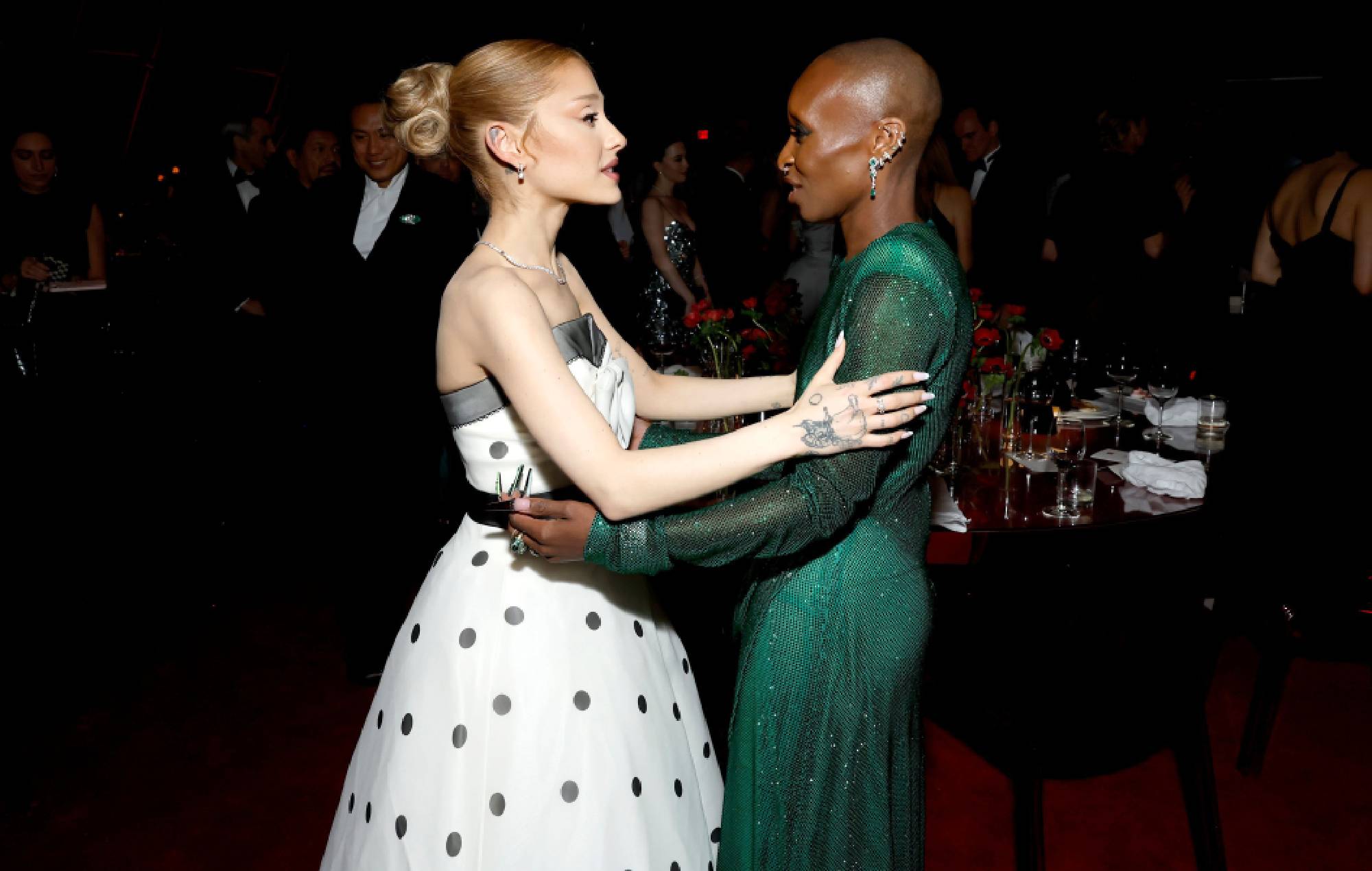 Ariana Grande and Cynthia Erivo embracing