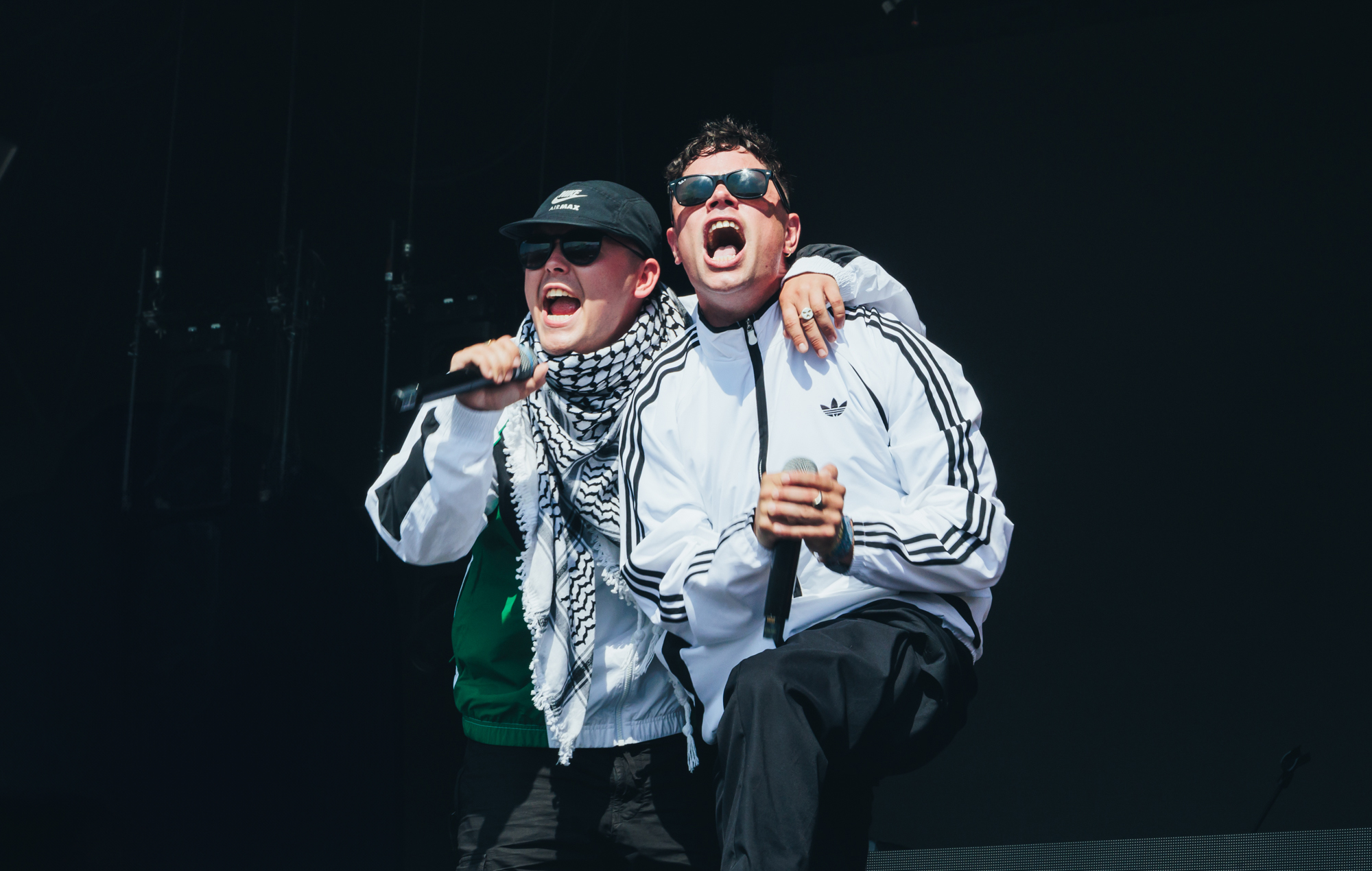 Kneecap's Mo Chara and Móglaí Bap perform at Glastonbury 2025, photo by Andy Ford