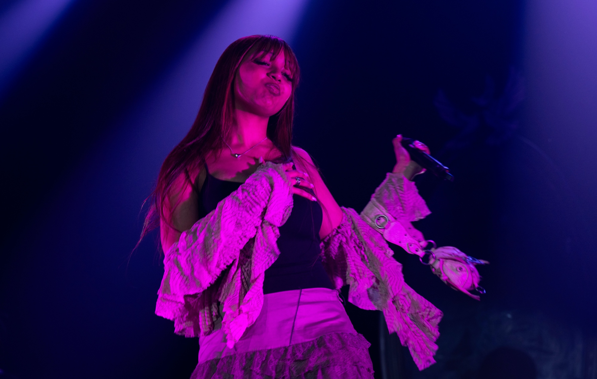 Pinkpantheress performing live on stage