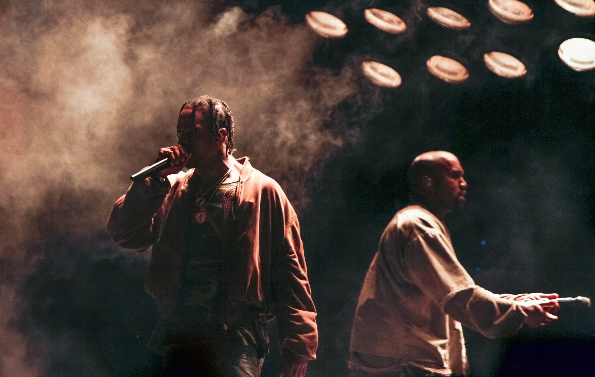 Travis Scott performs with Kanye West