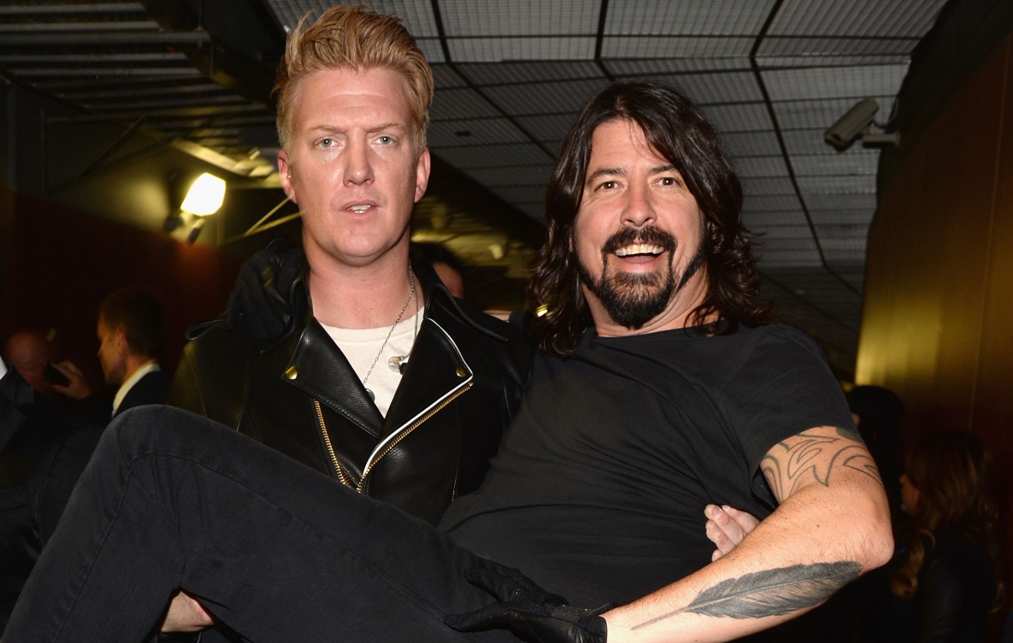 Josh Homme (L) of Queens of the Stone Age and Dave Grohl of Foo Fighters