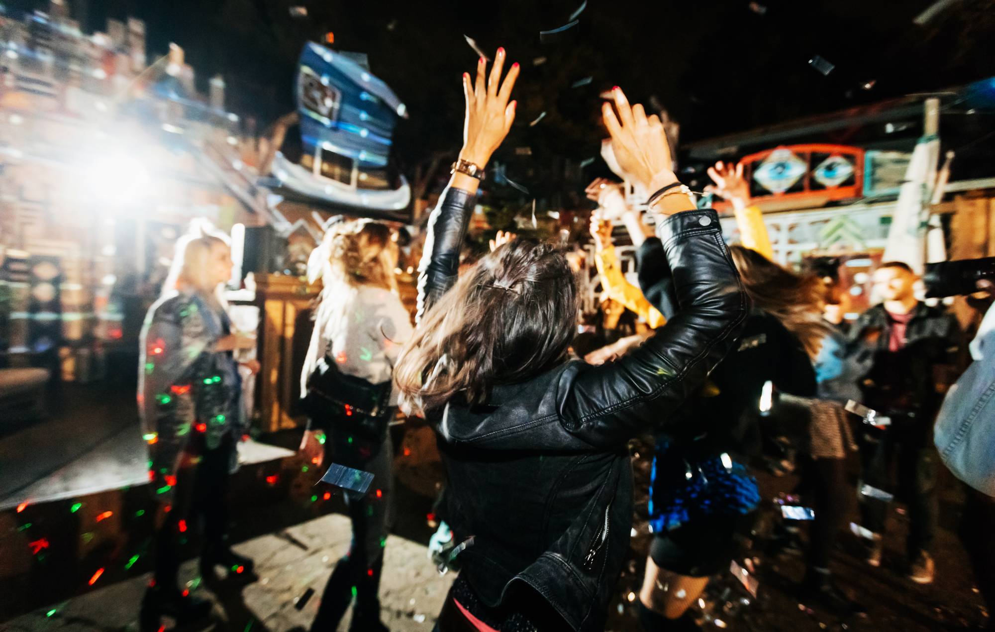 A young woman dancing at a nightclub. Credit hinterhaus Productions via GETTY