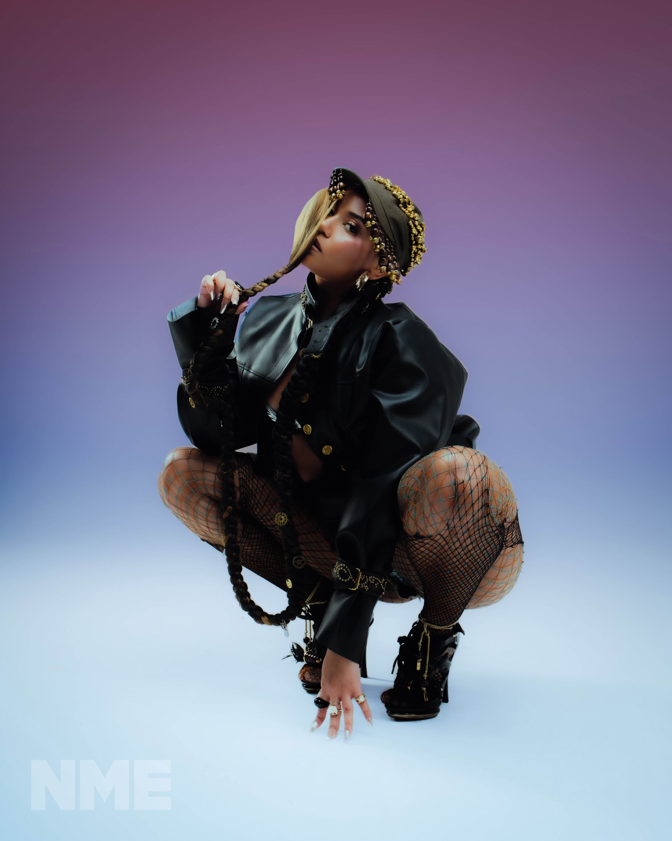 Moliy (2026), Moliy wears a hat by Hityshi, a jacket by Omolayo, a bra by Hityshi, custom shorts and shoes by Louis Vuitton, photo by Nirah Sanghani