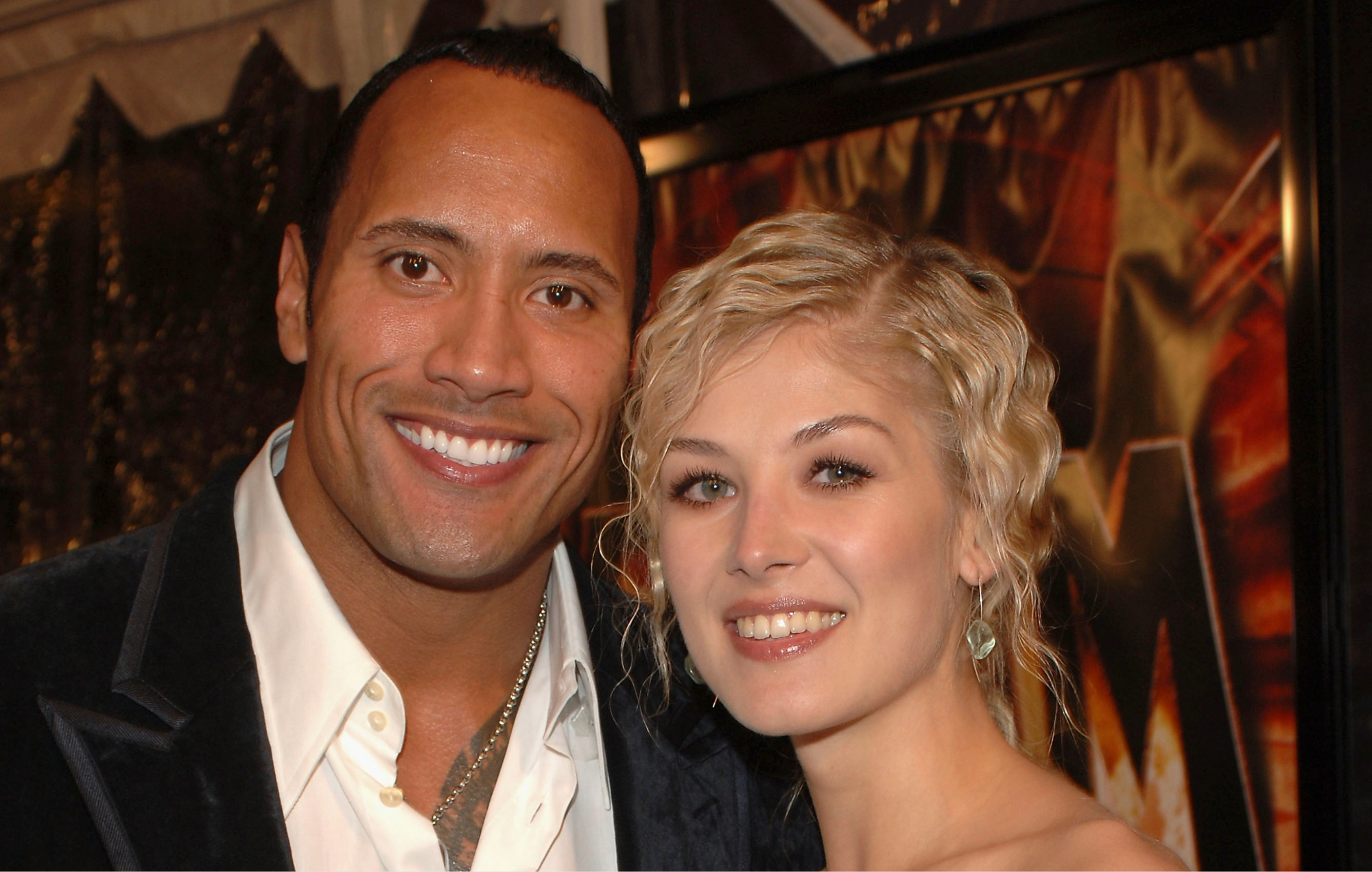 Dwayne Johnson and Rosamund Pike at the premiere of 'Doom'