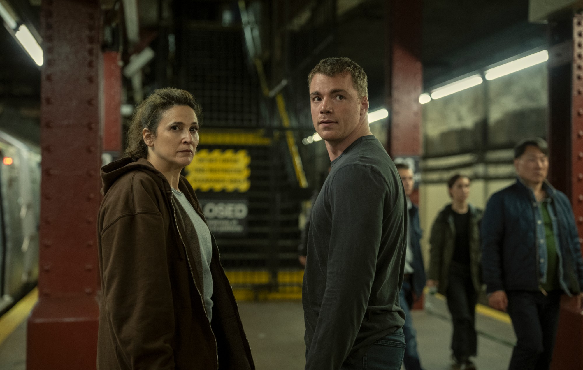 Michaela Watkins as Freya and Gabriel Basso as Peter in 'The Night Agent' season three.