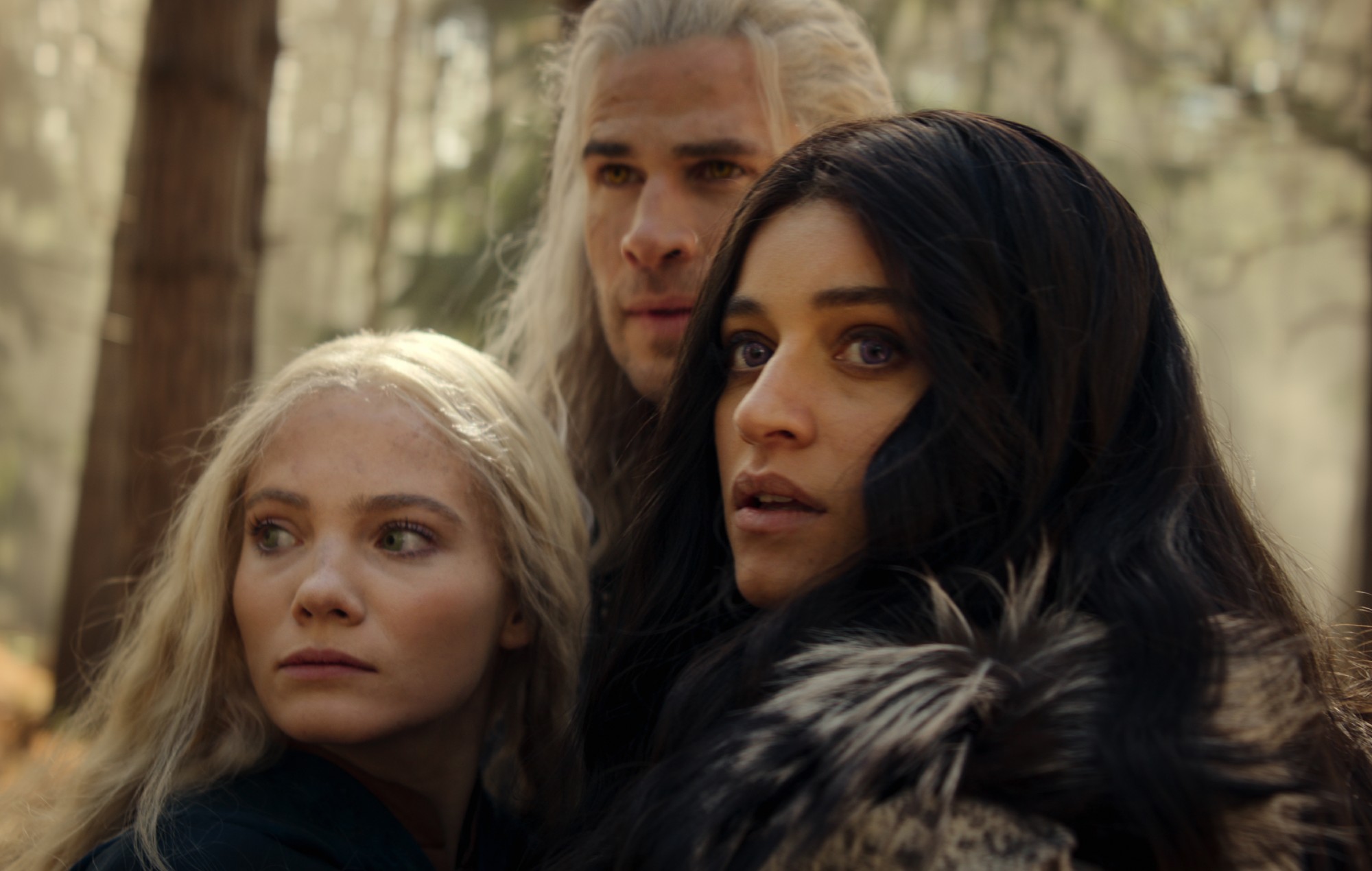 Freya Allan, Anya Chalotra and Liam Hemsworth in 'The Witcher' season four.