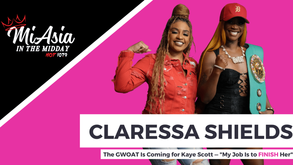 Two women posing in colorful outfits, one wearing a red jacket and the other a black lace-up top, with the text "CLARESSA SHIELDS" and "The GWOAT Is Coming for Kaye Scott — 'My Job Is to FINISH Her