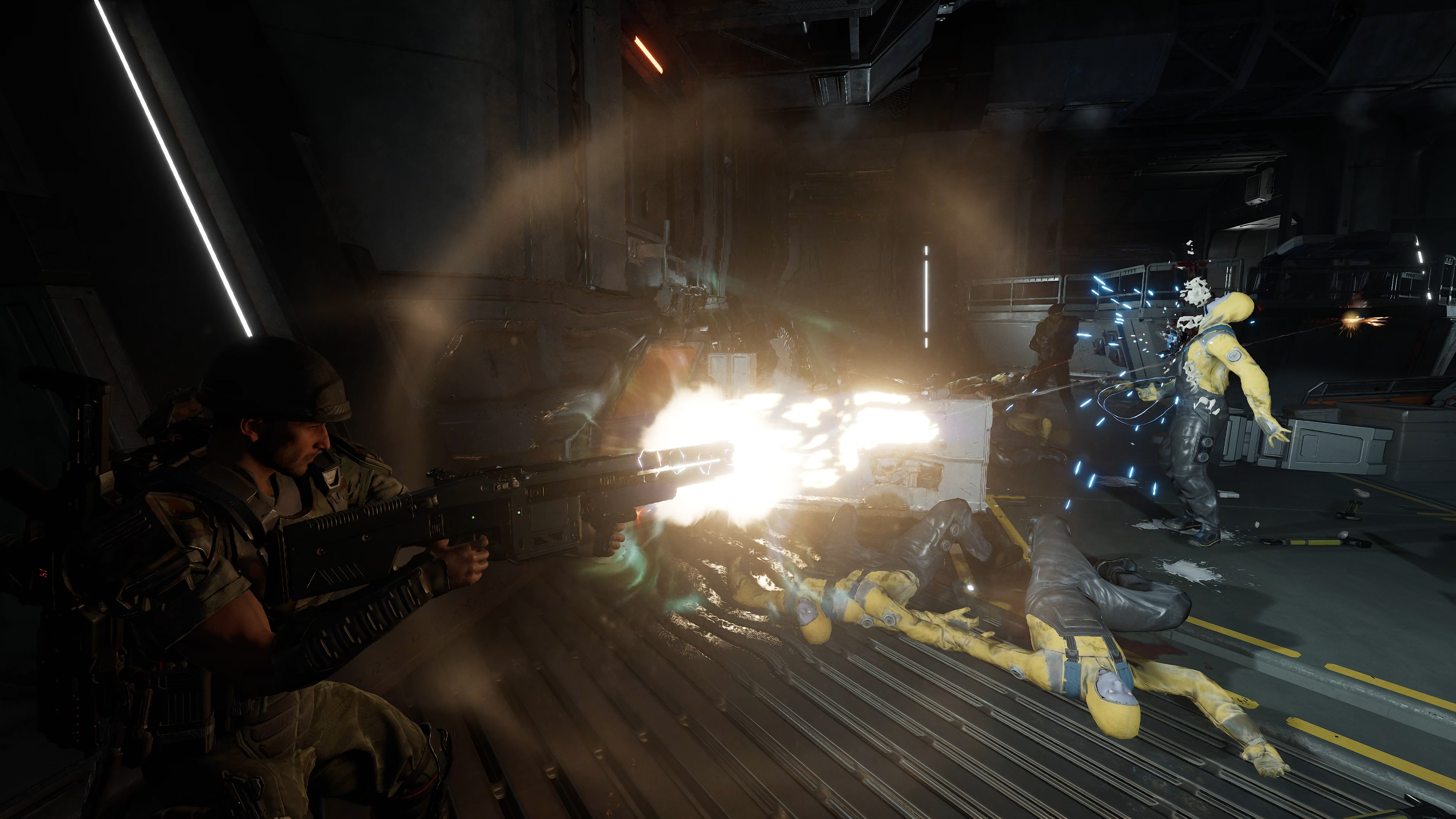 A dark, industrial scene with bright sparks and smoke, showing a person in protective gear operating machinery.
